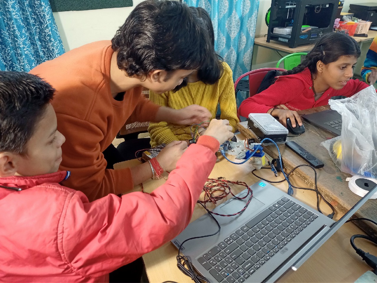 Students working with robotics