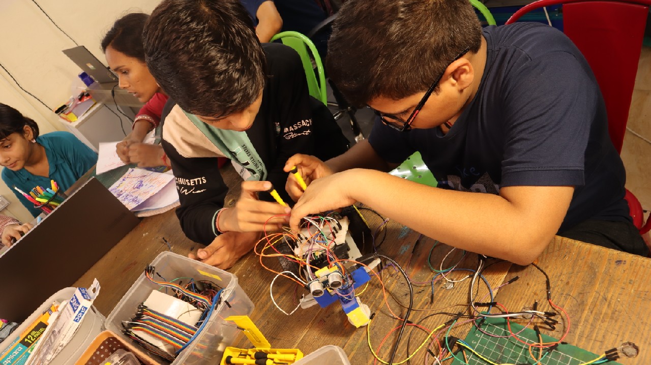 Students working on robotics in the makerspace